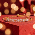 Zavera Gold Plated Floral Sparkle American Diamond Bracelet for Women