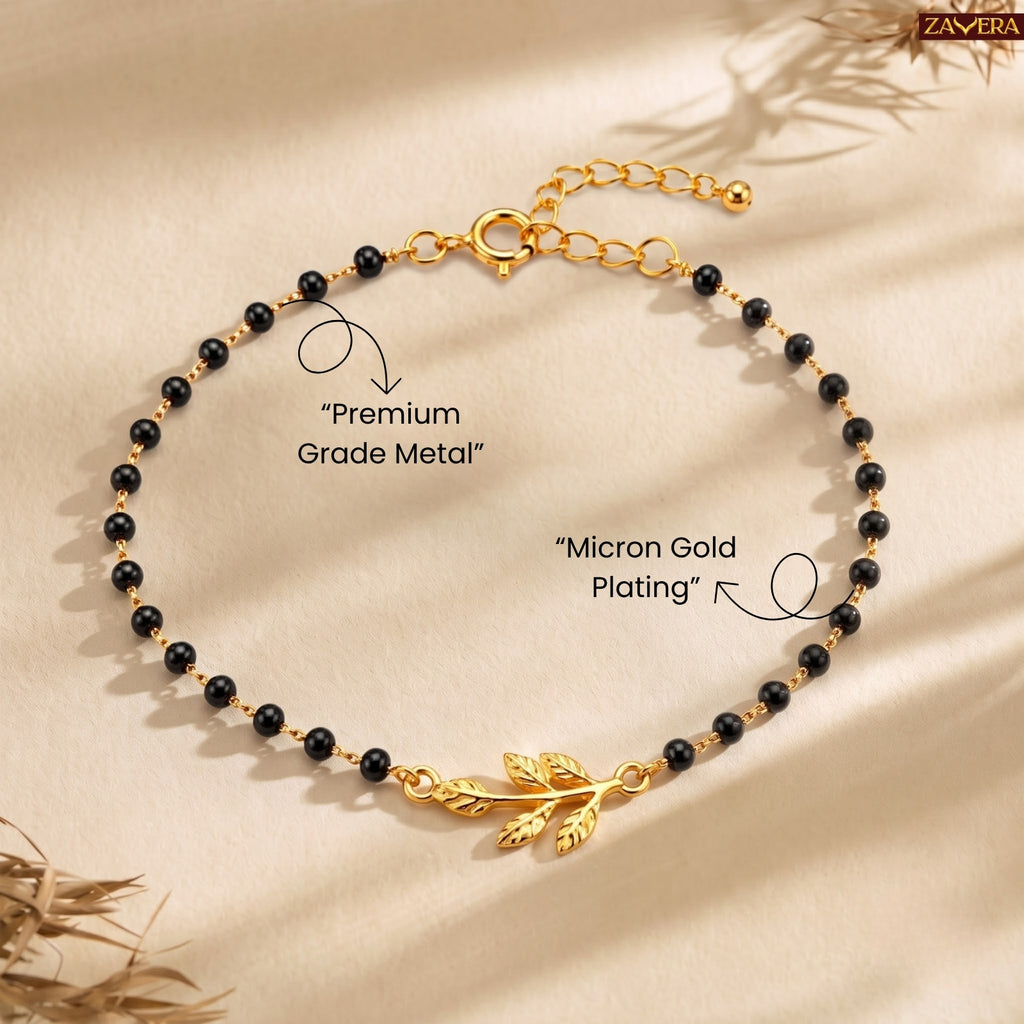 Zavera Gold Plated Black Bead Leaf Charm Bracelet for Women