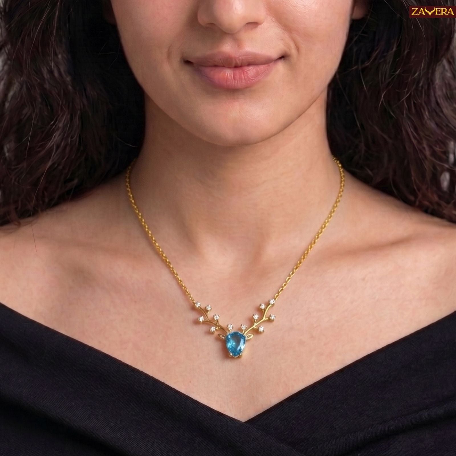 Zavera Gold Plated Elegant Blue Crystal Deer Antler Pendant For Women