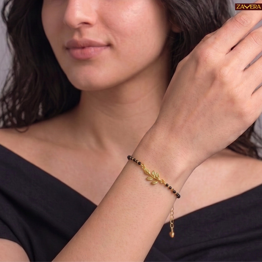 Zavera Gold Plated Black Bead Leaf Charm Bracelet for Women