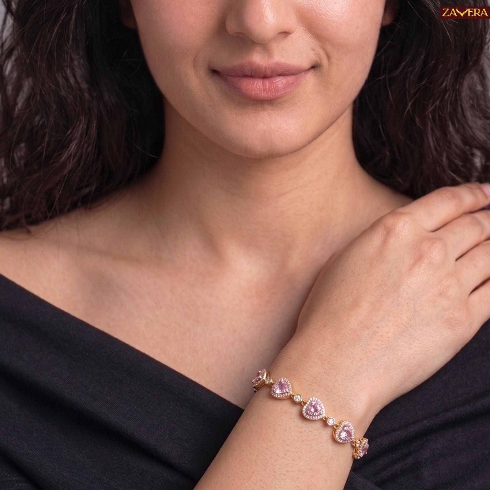 Zavera Gold Plated Pink Heart American Diamond Bracelet for Women