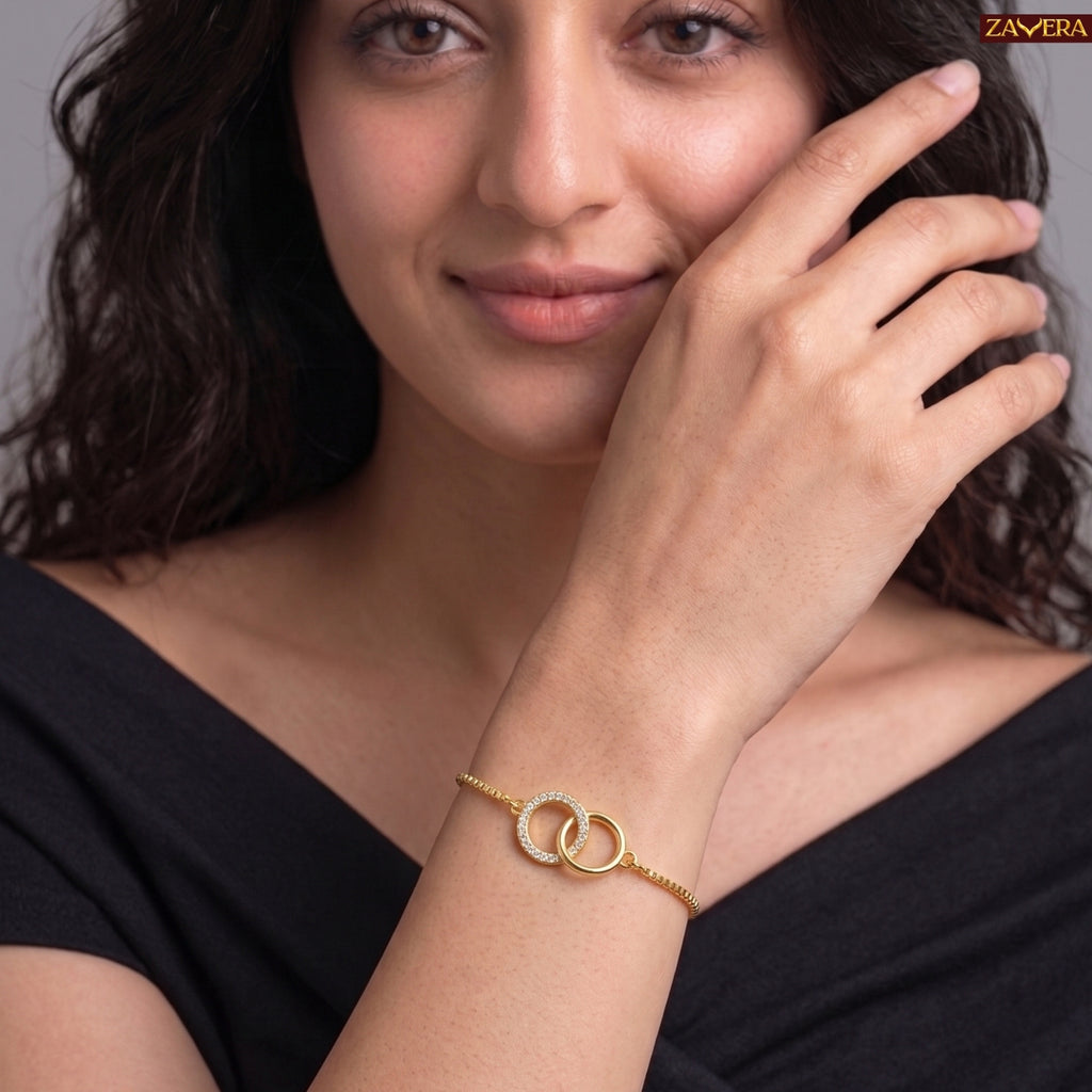 Zavera Gold Plated American Diamond Interlocking Circle Bracelet for Women