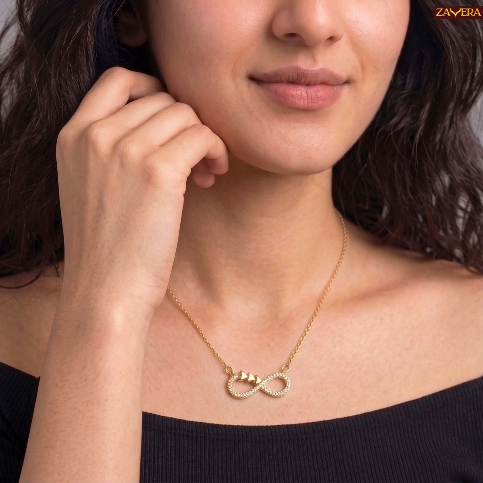 Zavera Gold Plated Crystal Infinity Heart Pendant For Women