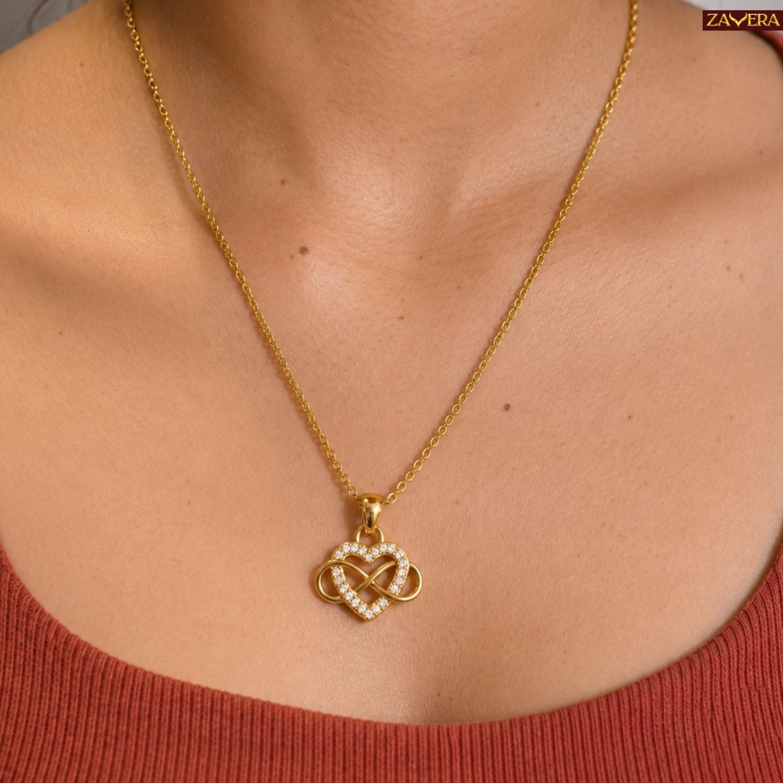Zavera Gold Plated Elegant Infinity Heart Pendant For Women