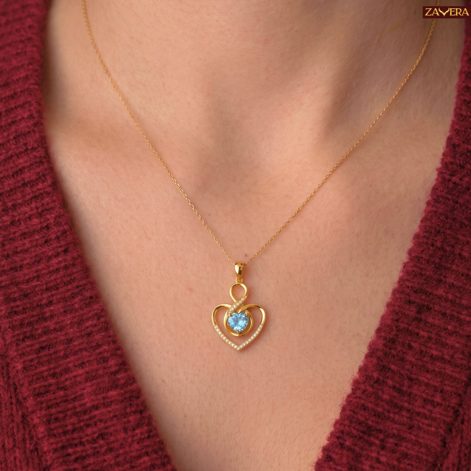 Zavera Gold Plated Blue Heart Crystal Pendant For Women