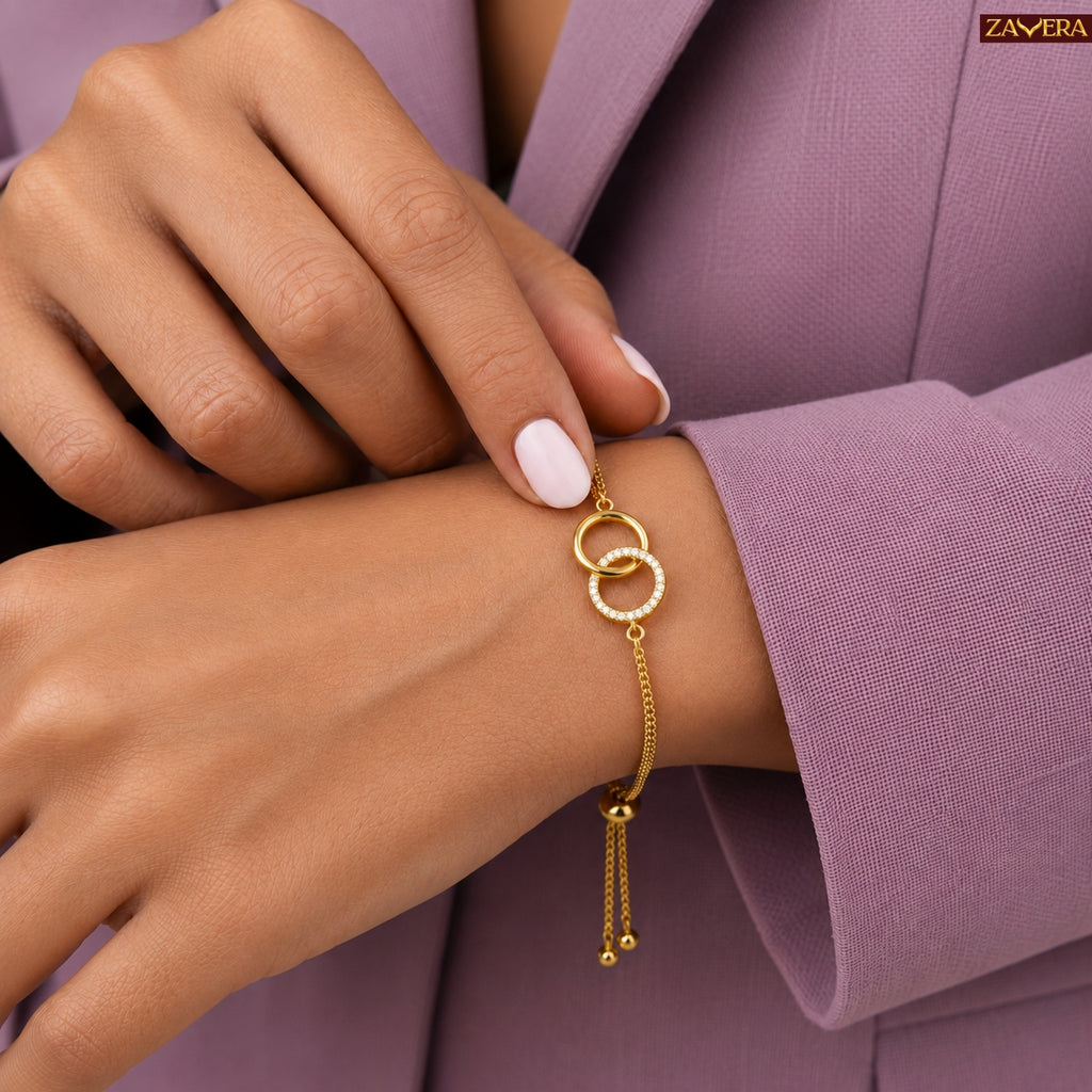 Zavera Gold Plated American Diamond Interlocking Circle Bracelet for Women