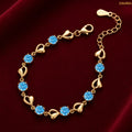 Zavera Gold Plated Aquamarine Blue CZ Heart Link Chain Bracelet for Women
