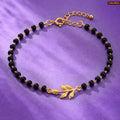 Zavera Gold Plated Black Bead Leaf Charm Bracelet for Women
