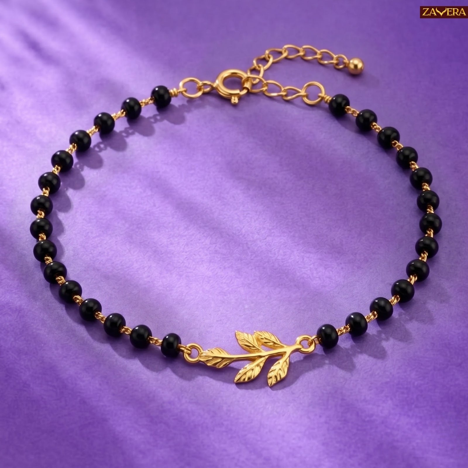 Zavera Gold Plated Black Bead Leaf Charm Bracelet for Women